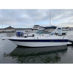 1990 Doral Monticello – 27’ Express Cruiser